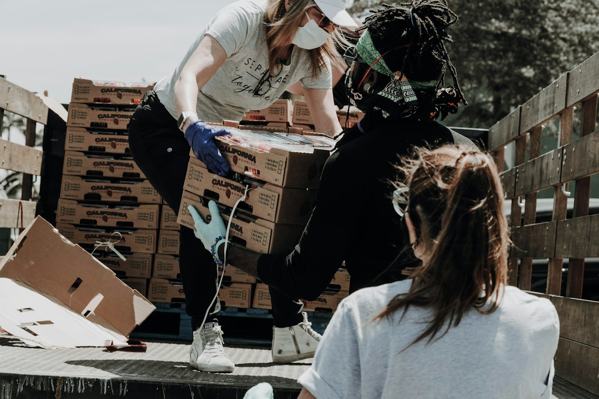 Volunteers serving food compassion outreach
